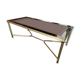 Coffee table in gilded brass and glass top