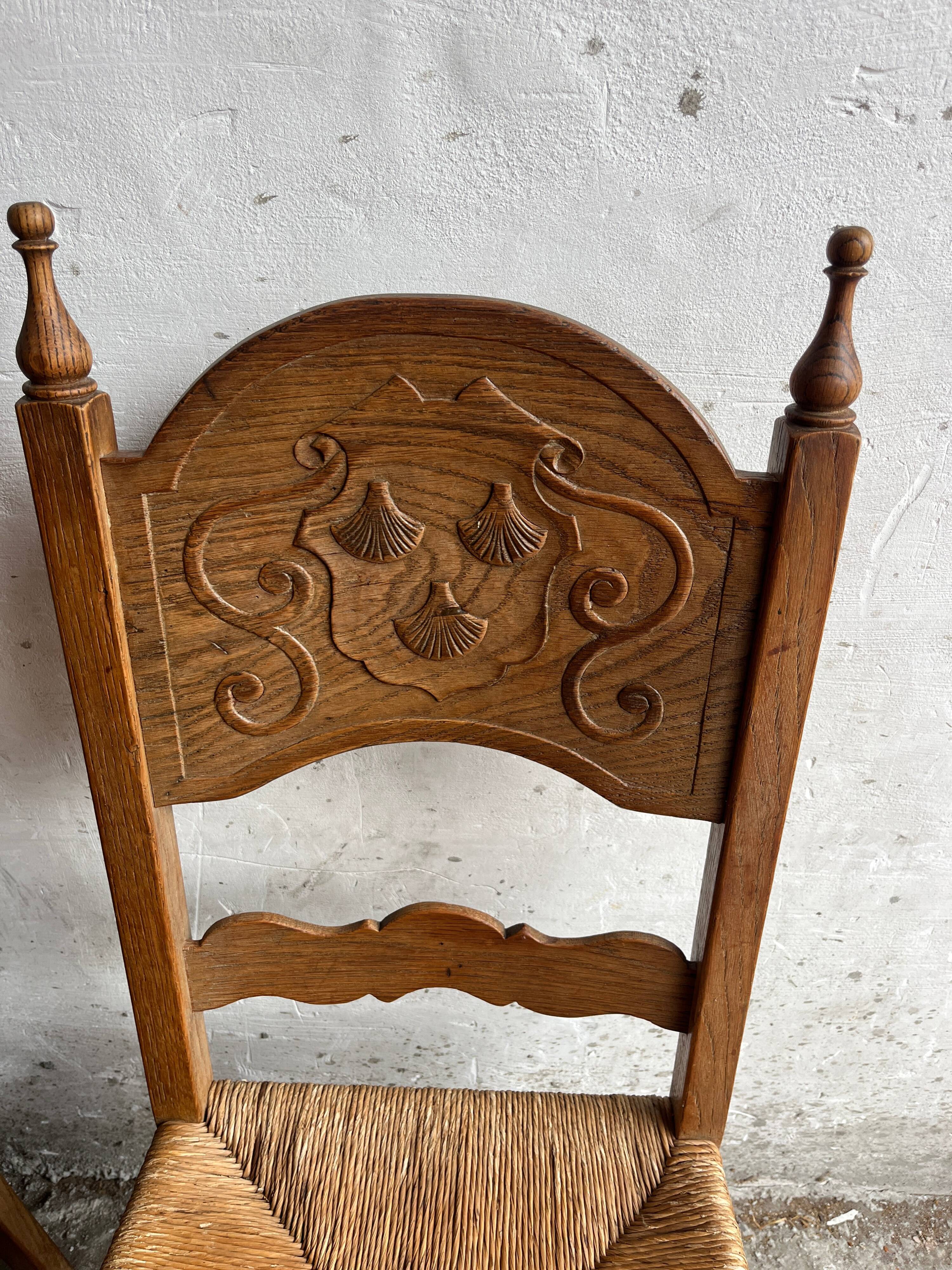 Set of 6 sculpted oak chairs with straw seats – 1950s