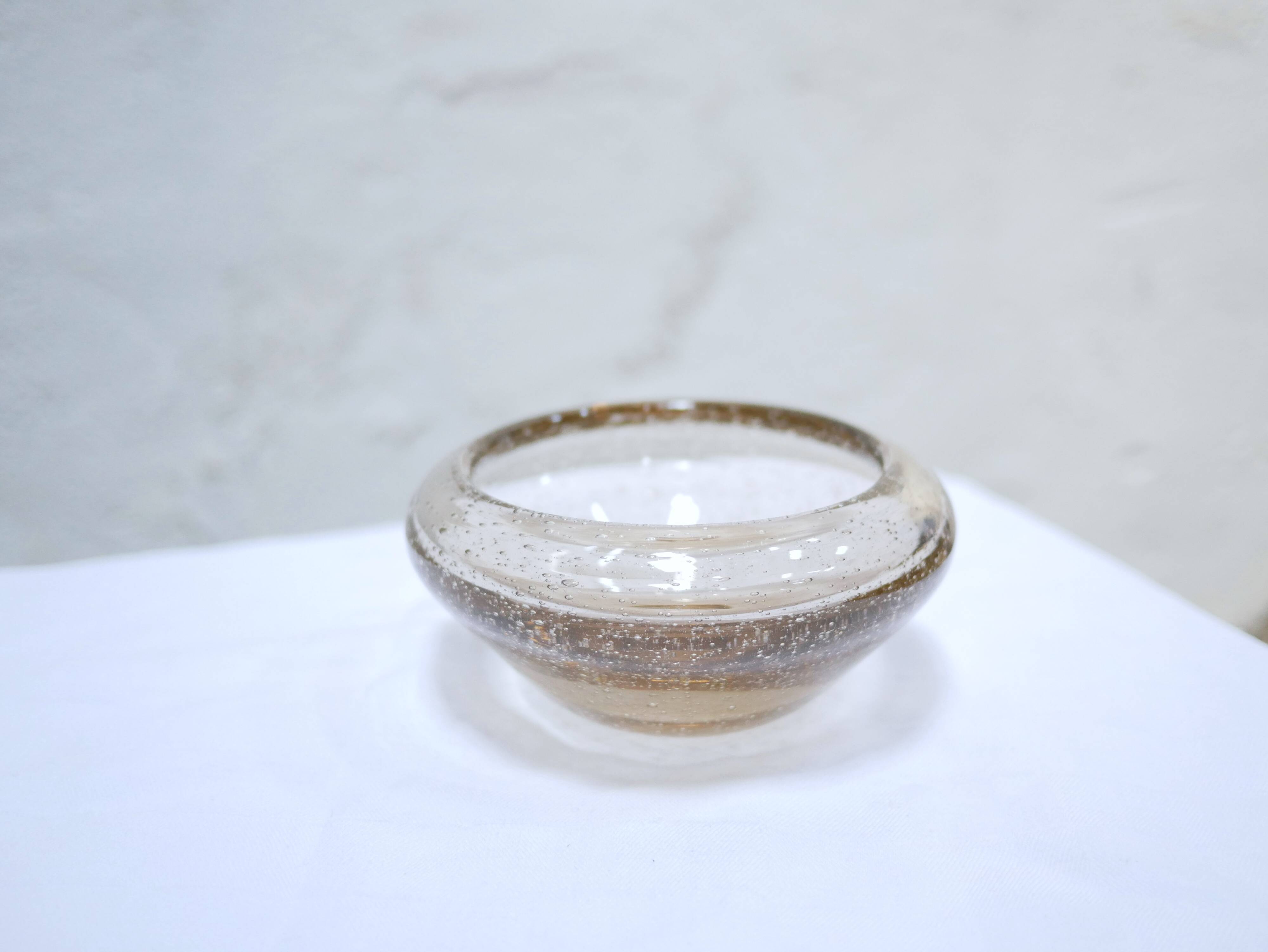 Empty vintage glass pocket blown by the glassworks of Biot