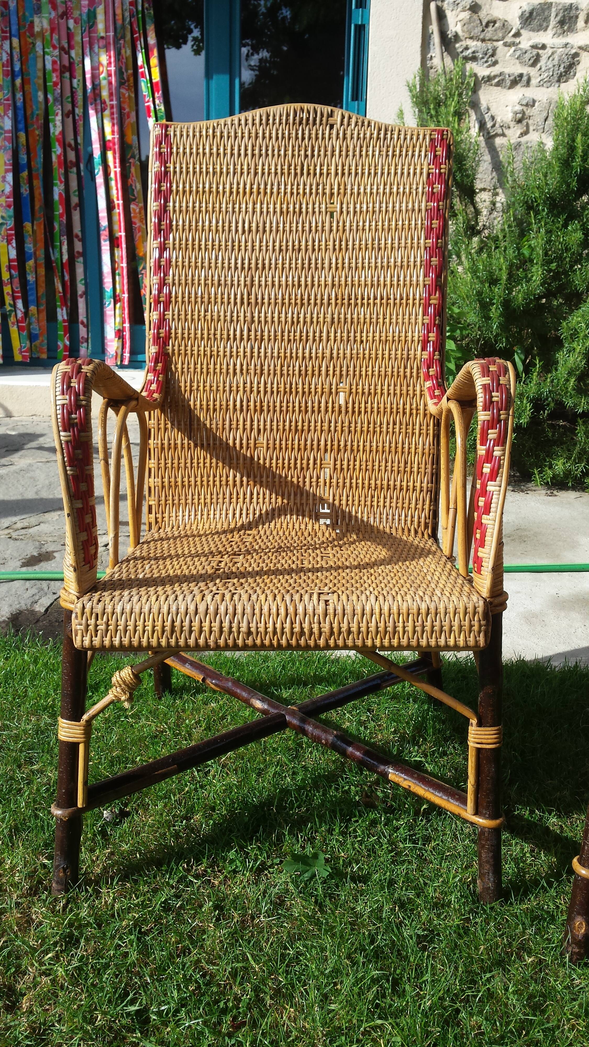 Wicker or rattan armchairs and bamboo