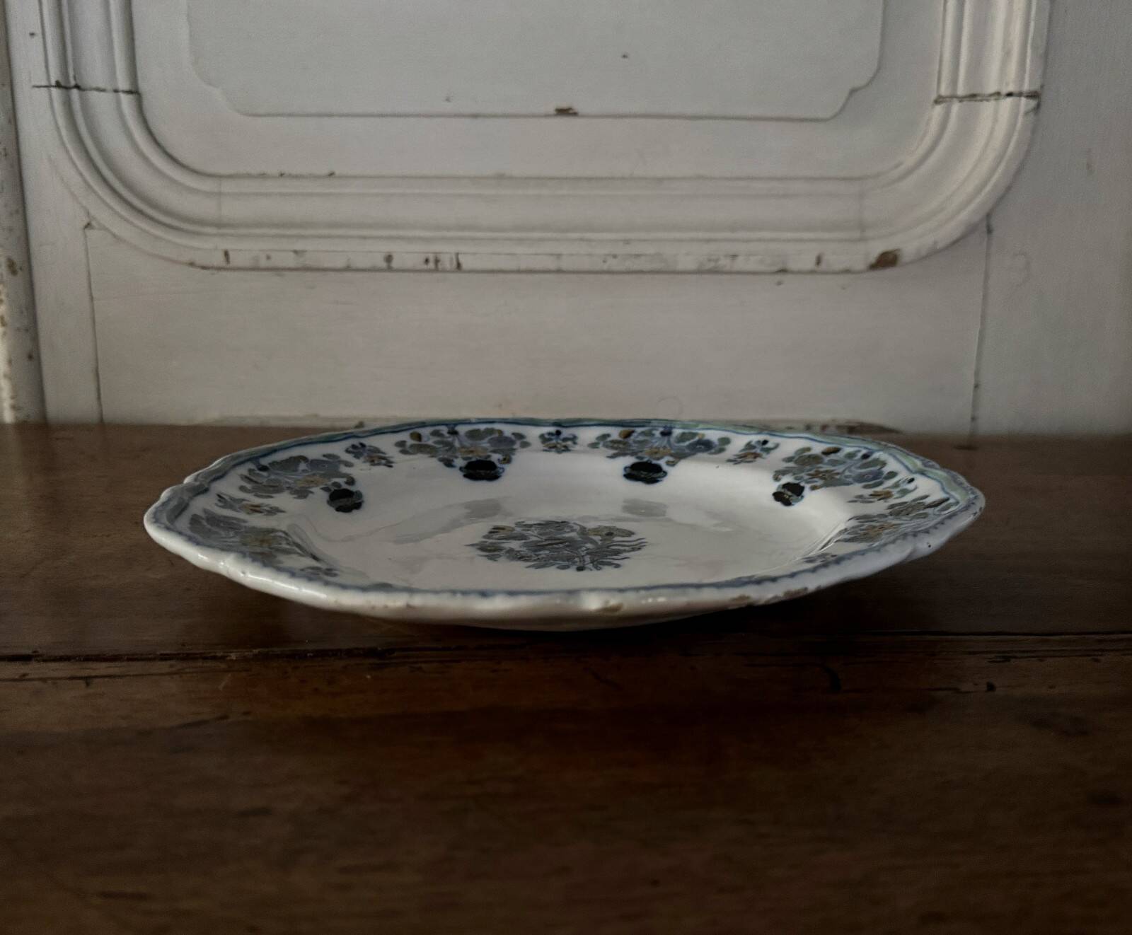 18th-century Moustiers earthenware plate with floral decoration