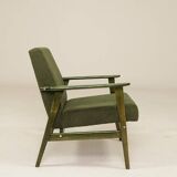 Scandinavian armchair deep olive green 1970s Boho style