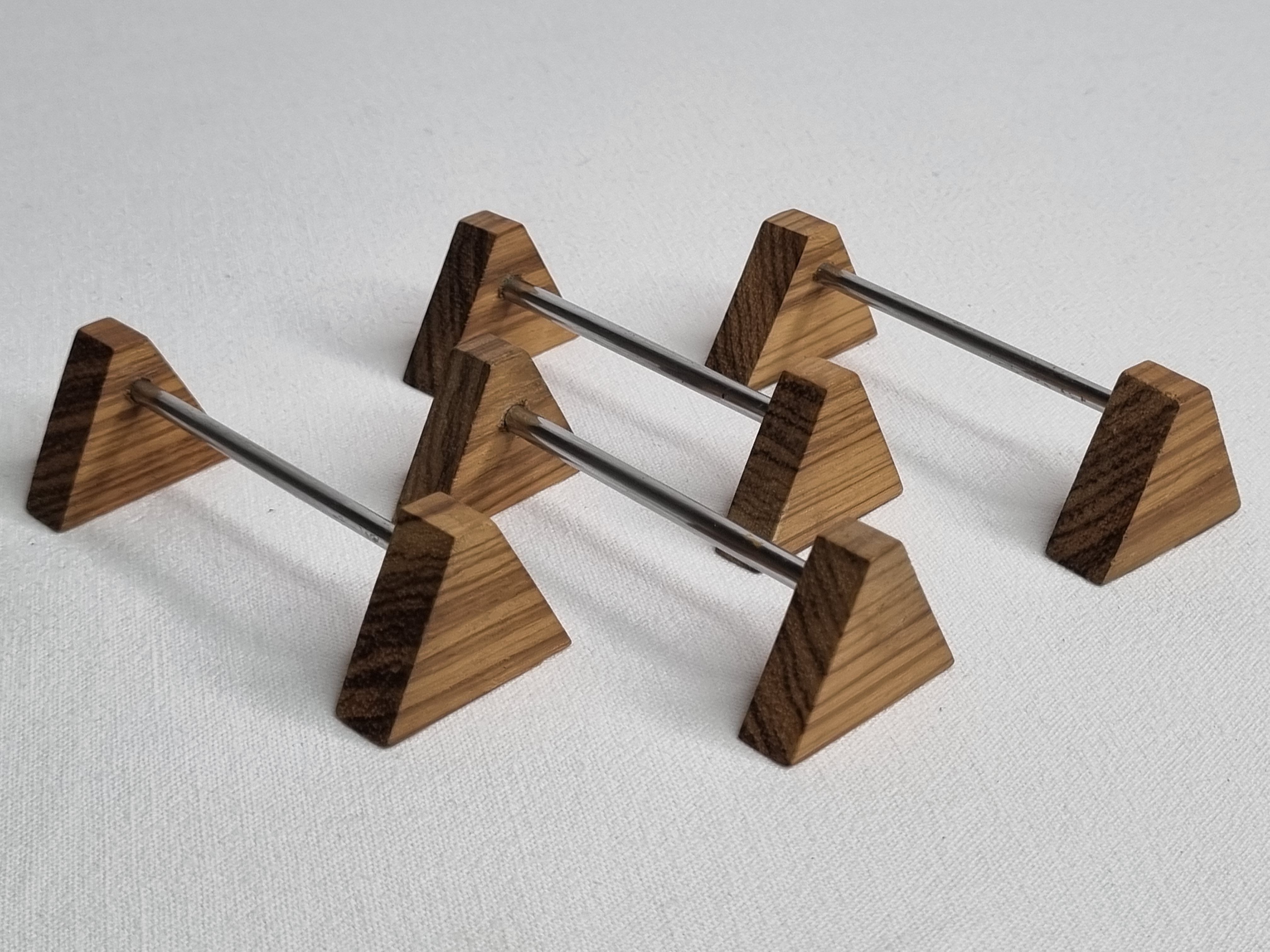 Set of four vintage metal and wood knife holders