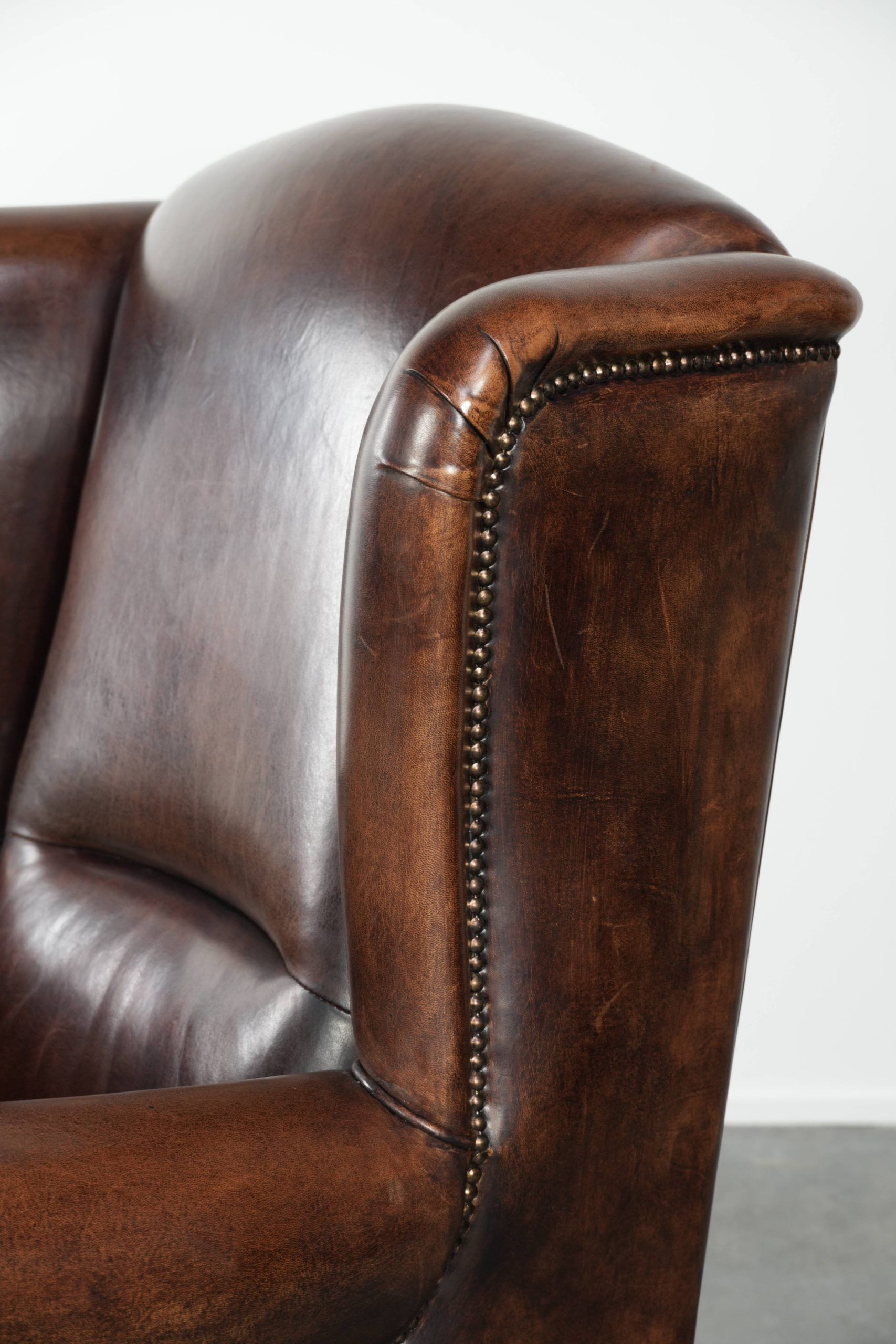 Sheepskin wingback armchair with beautiful deep and warm colours