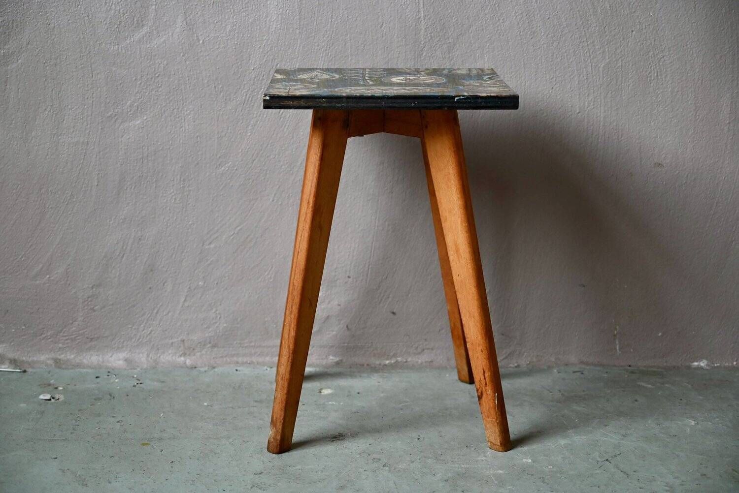 Plant stand side table 1970s Scandinavian patterns with tapered legs.
