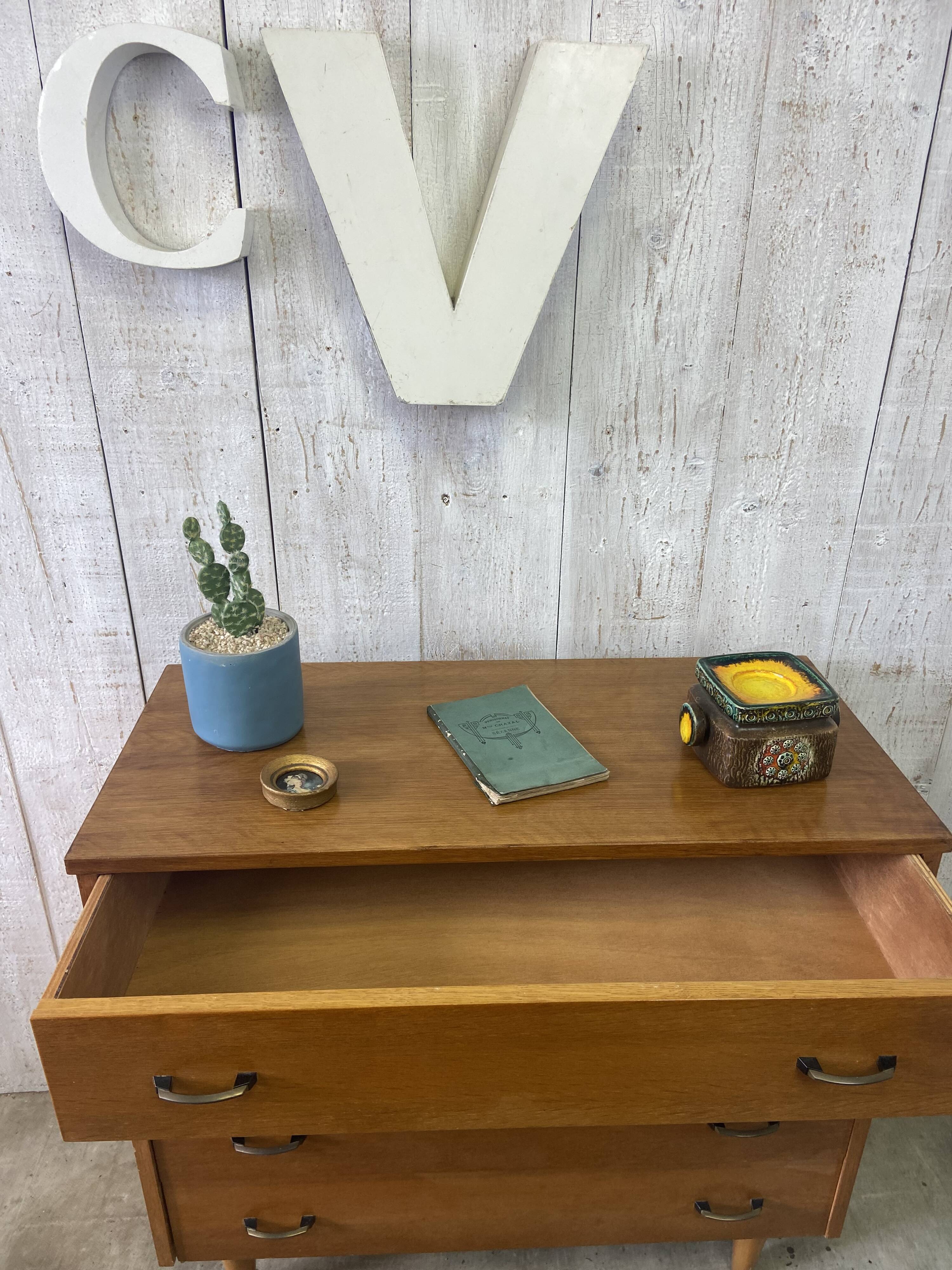 Vintage chest of drawers with conical legs