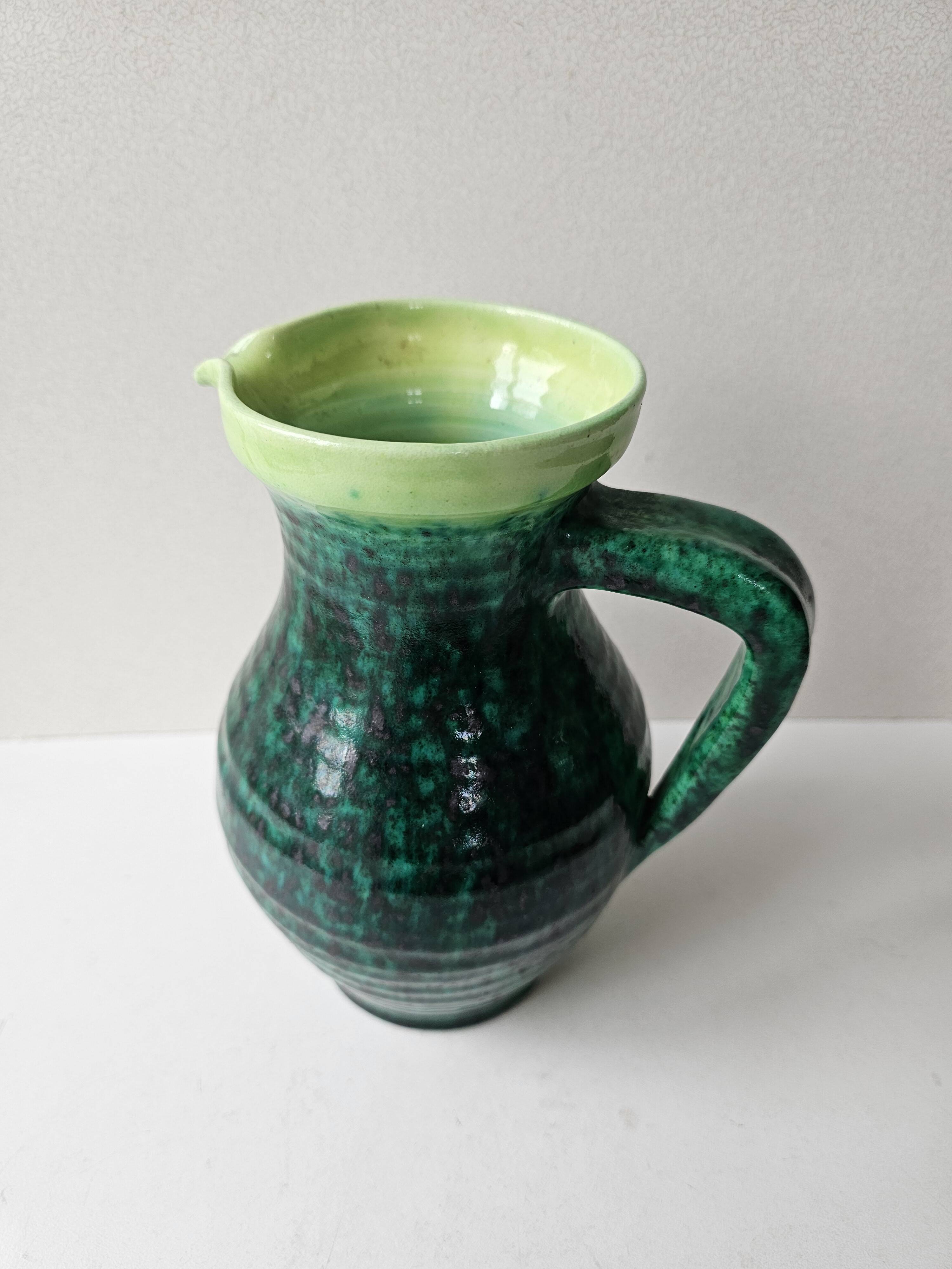 Green glazed ceramic pitcher Signed ACCOLAY