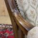 Fauteuil Voltaire du XIXème en noyer - L=68cm, P=78cm, H=1m07, H assise=40cm.