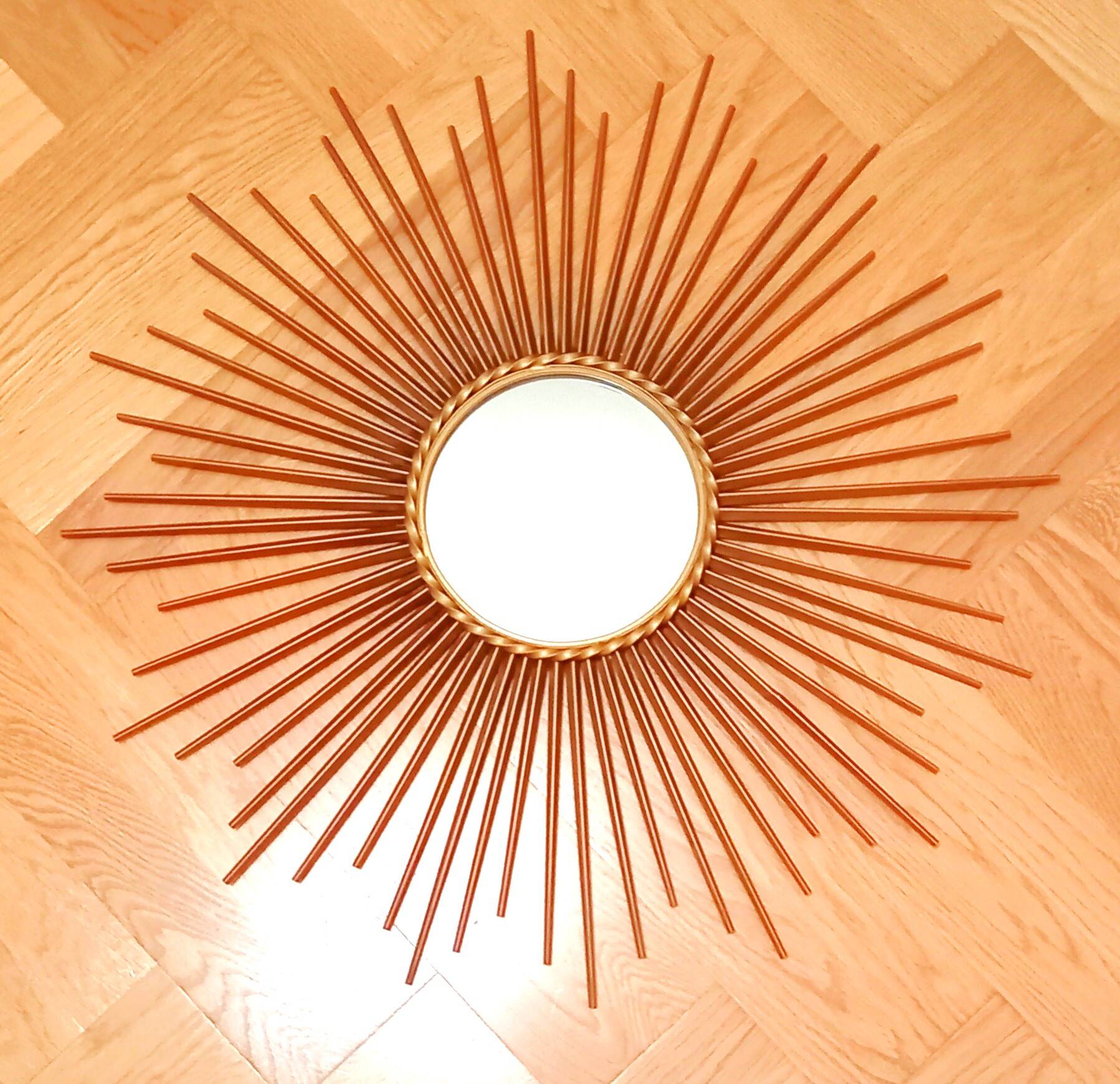 vintage gold metal sun mirror
