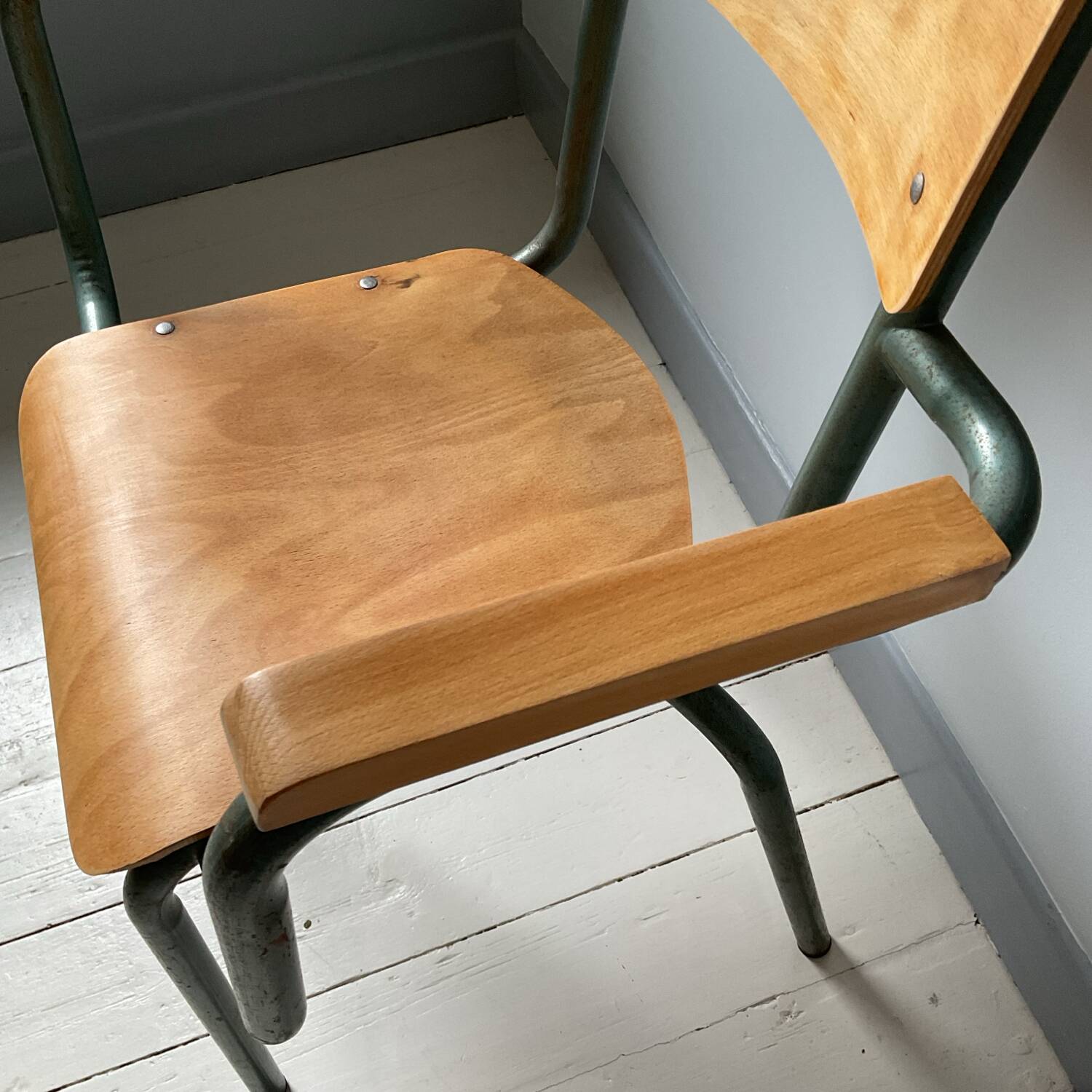 Set of four school teacher armchairs