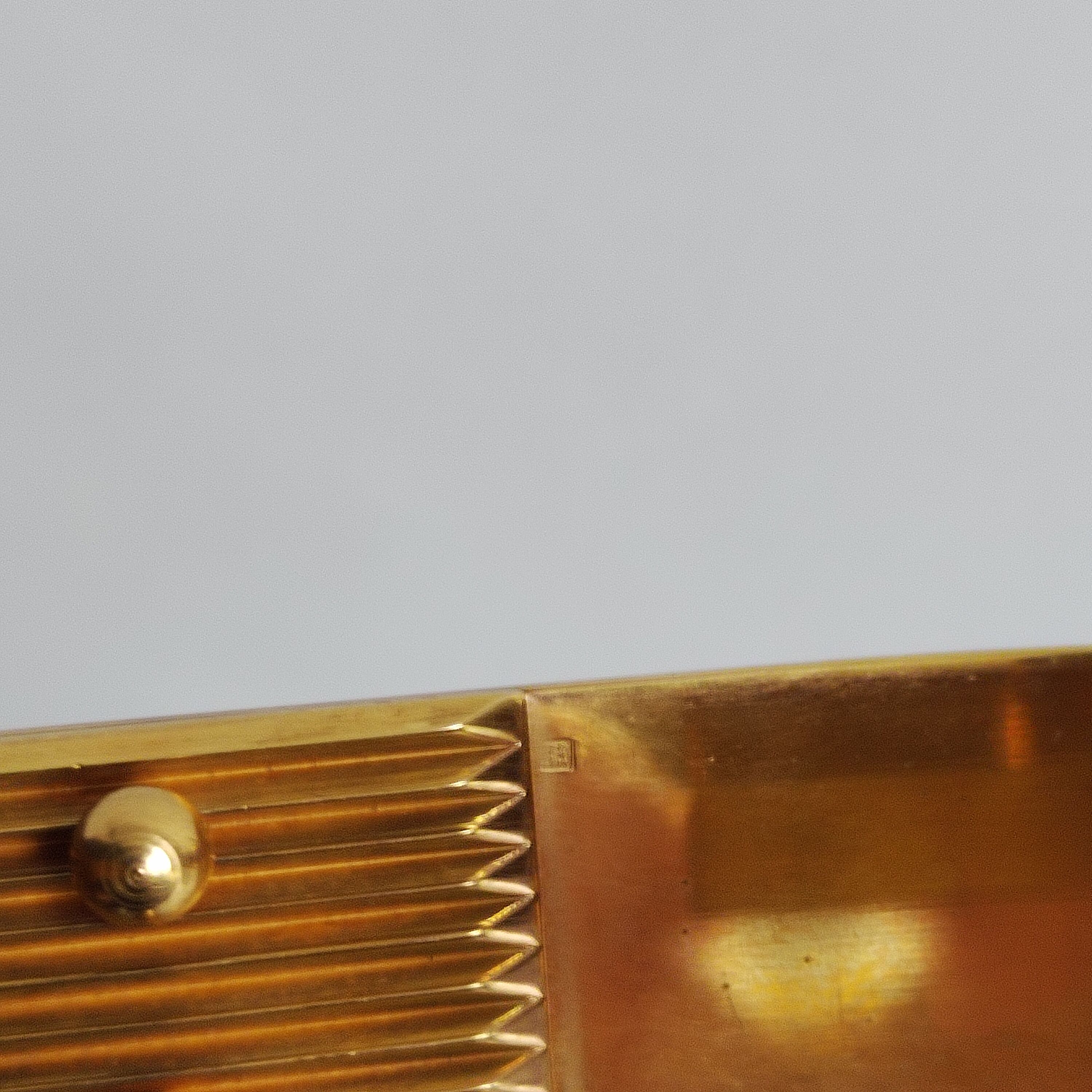 Pair of vintage Art Deco style bookends in marble and gold-plated metal