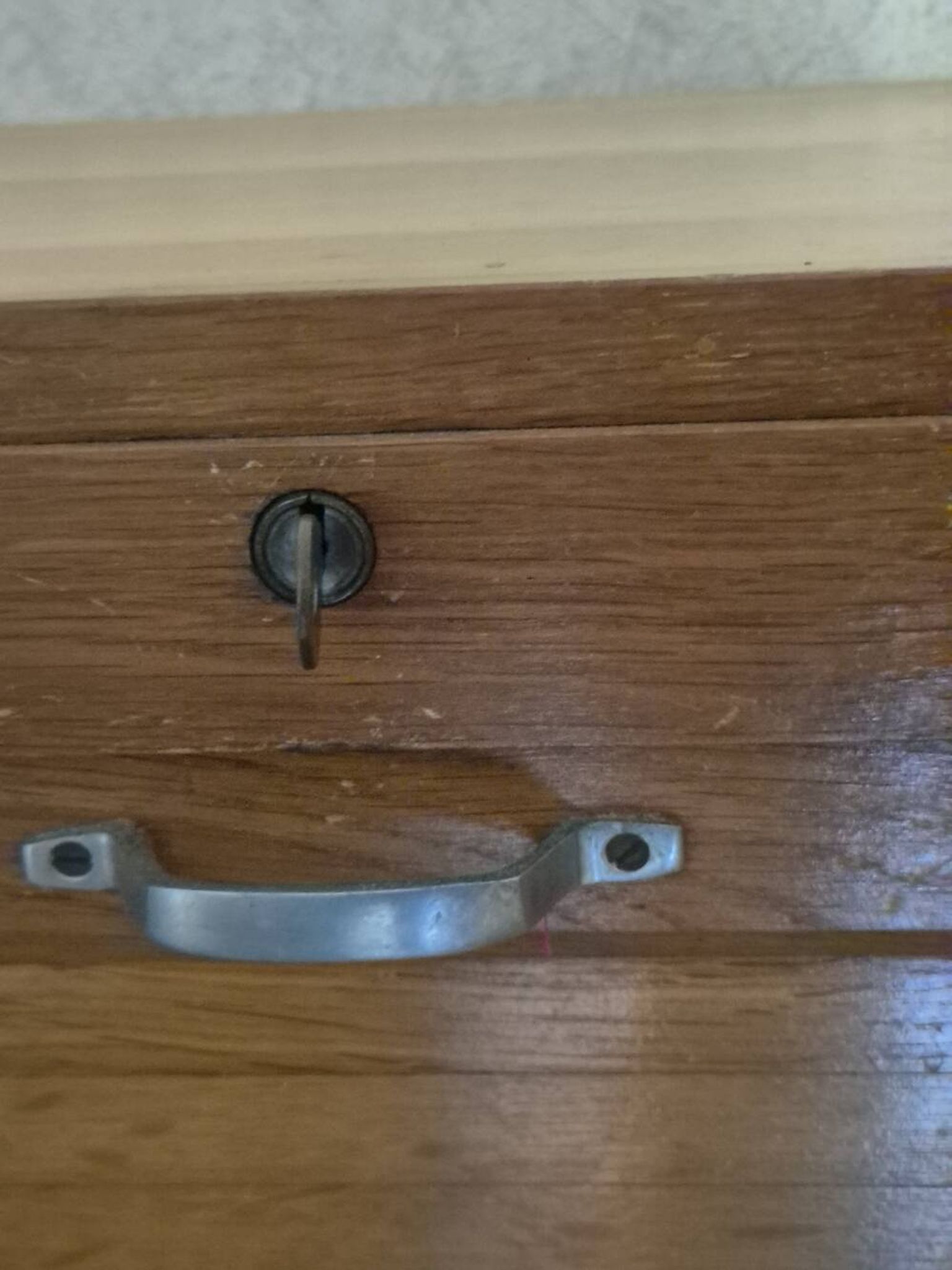 Filing cabinet with curtain, lock and key