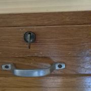 Filing cabinet with curtain, lock and key