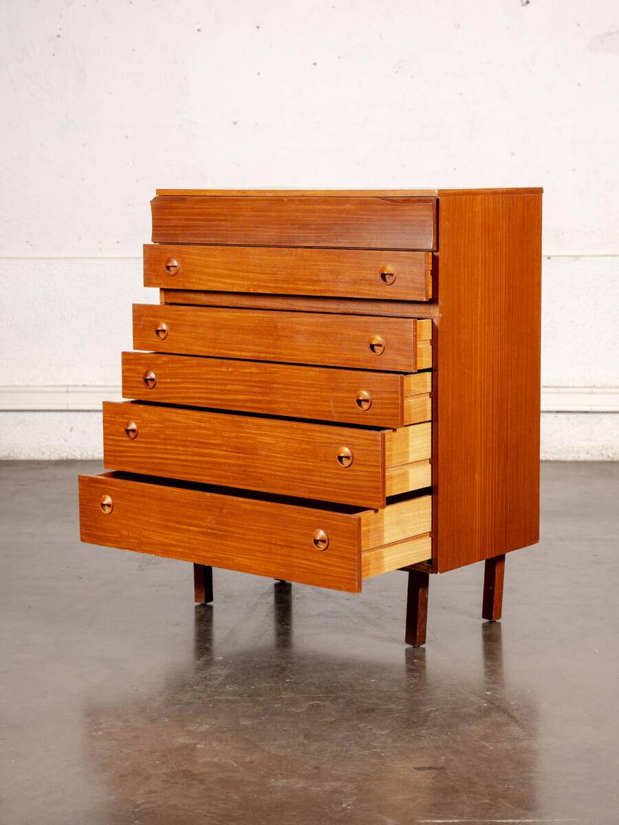 Large English teak chest of drawers
