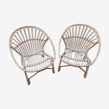 Paire de fauteuils coquilles en rotin