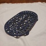 dessous de plat en fonte - ancien