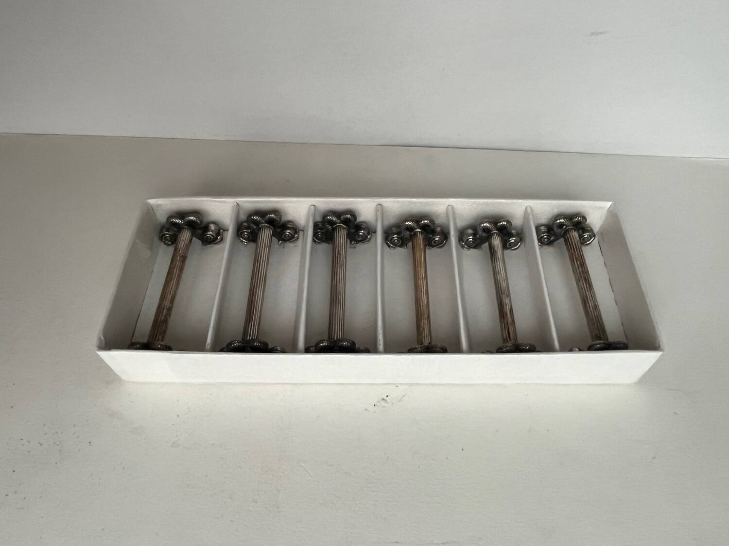 6 silver metal knife holders