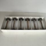 6 porte couteaux en métal argenté