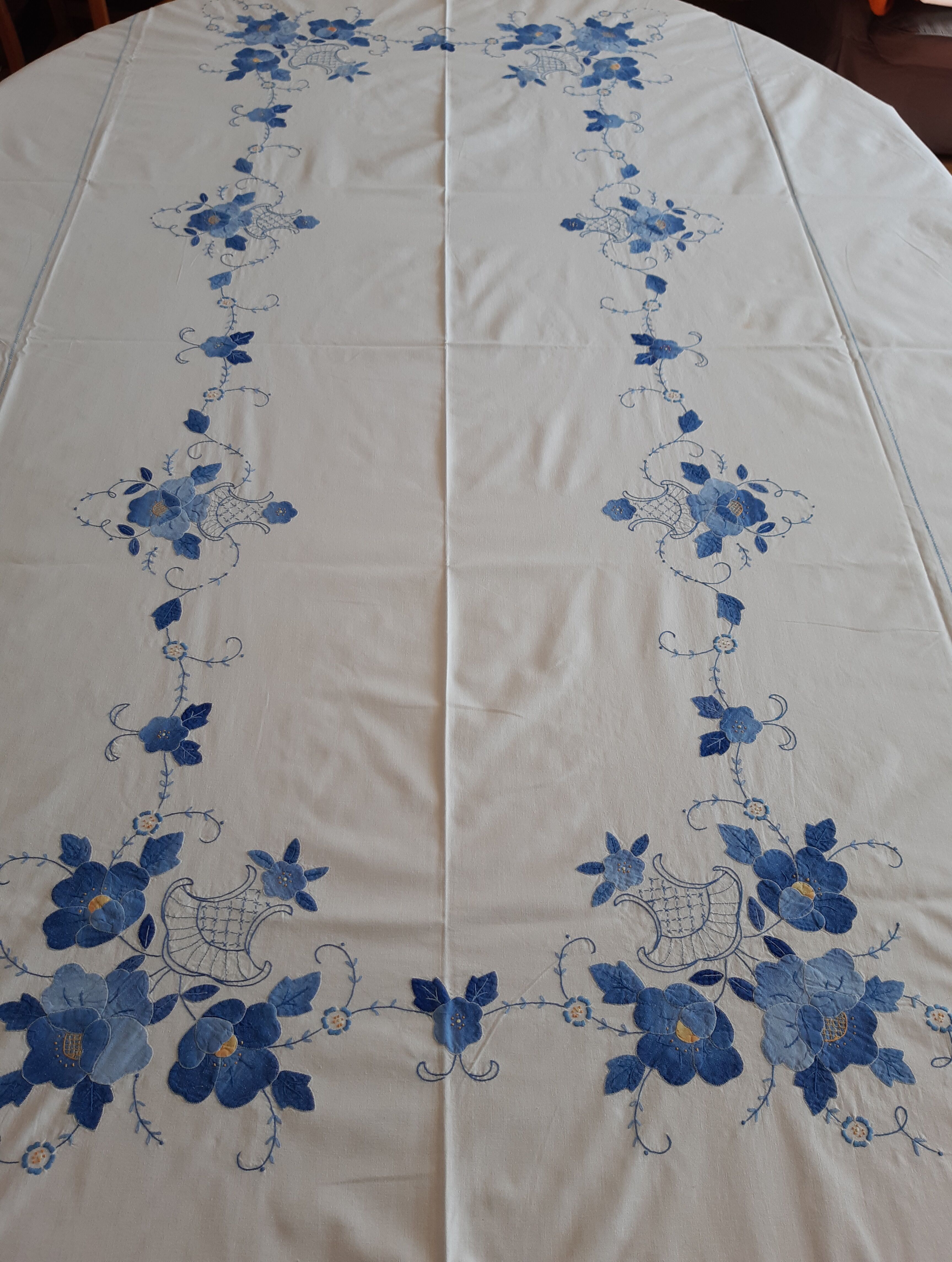 Blue hand embroidered coat with 12 towels