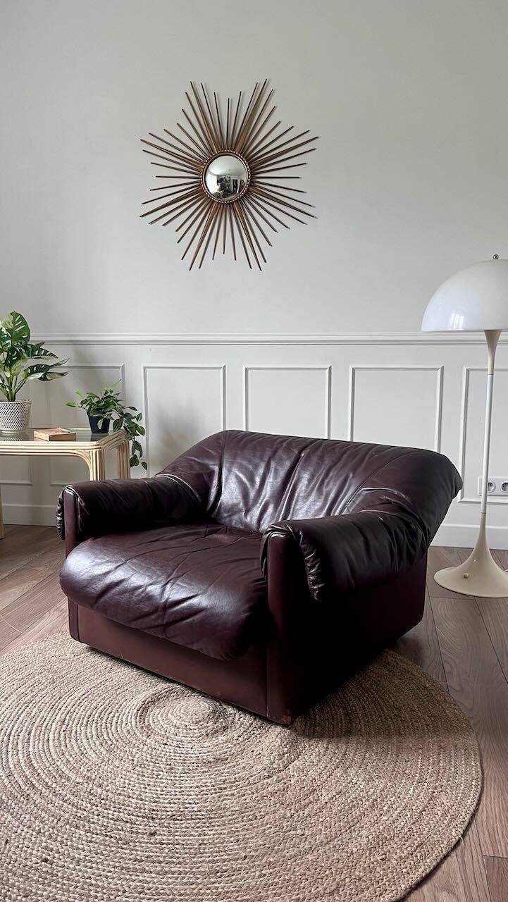 Brown leather armchair from the 1970s.