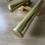 Tubular wall sconces in brass, Italian design from the 1970s, attributed.