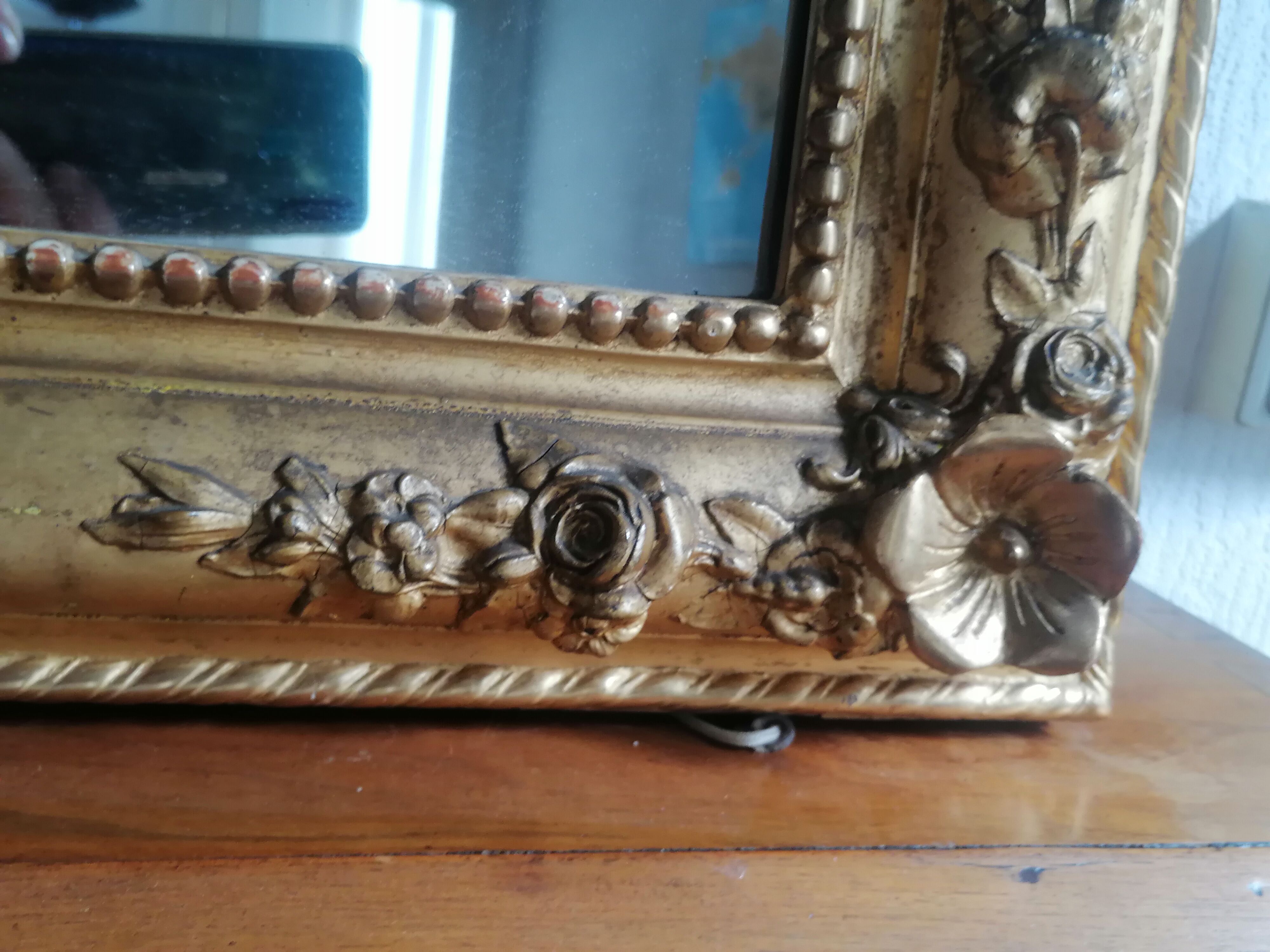 Grand miroir doré. 19ème
