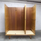 French wardrobe with tapered legs, 3 doors, 1 mirror (27*130), and 1 drawer.