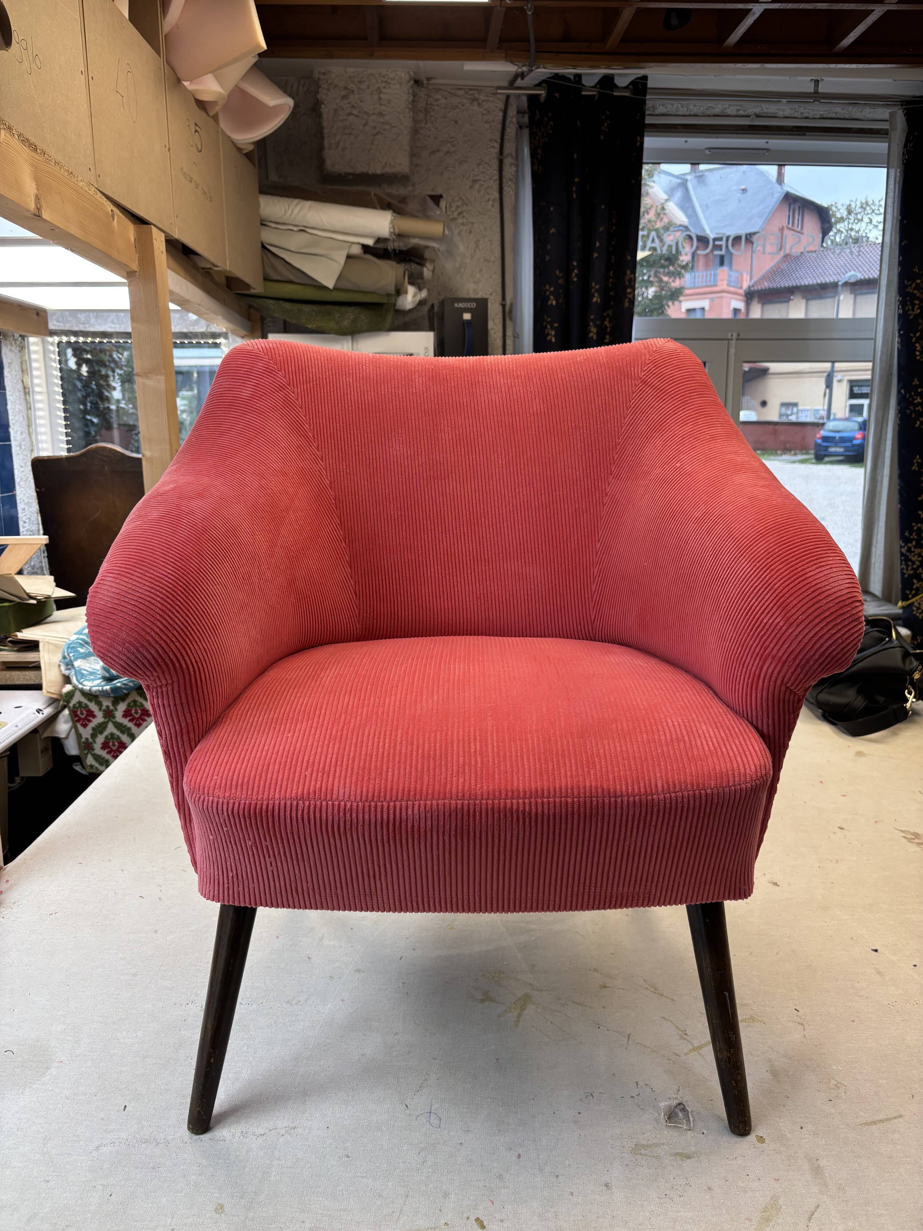 compass foot armchair