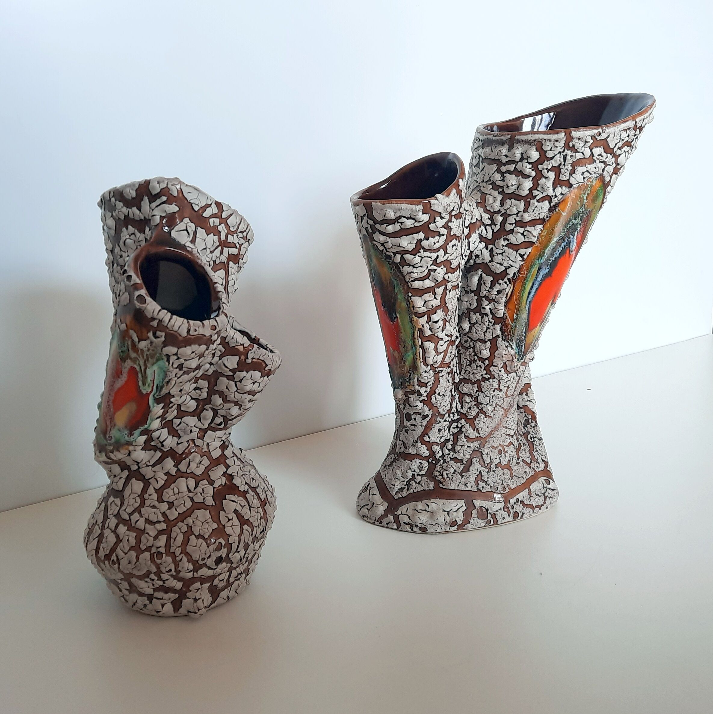 2 Vases of Vallauris in ceramic swaddled volcanic effect.