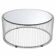 A round coffee table with a mirrored top, from the 1990s.