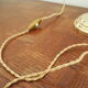 Desk lamp in brass with a swan neck and green opaline glass.