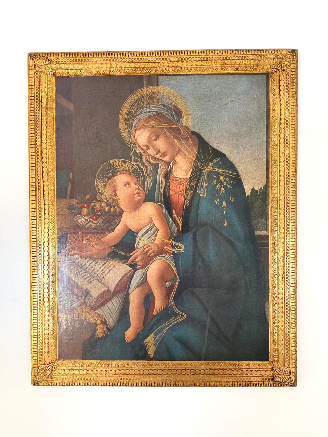 Religious icon on gilded wood: The Madonna of the Book
