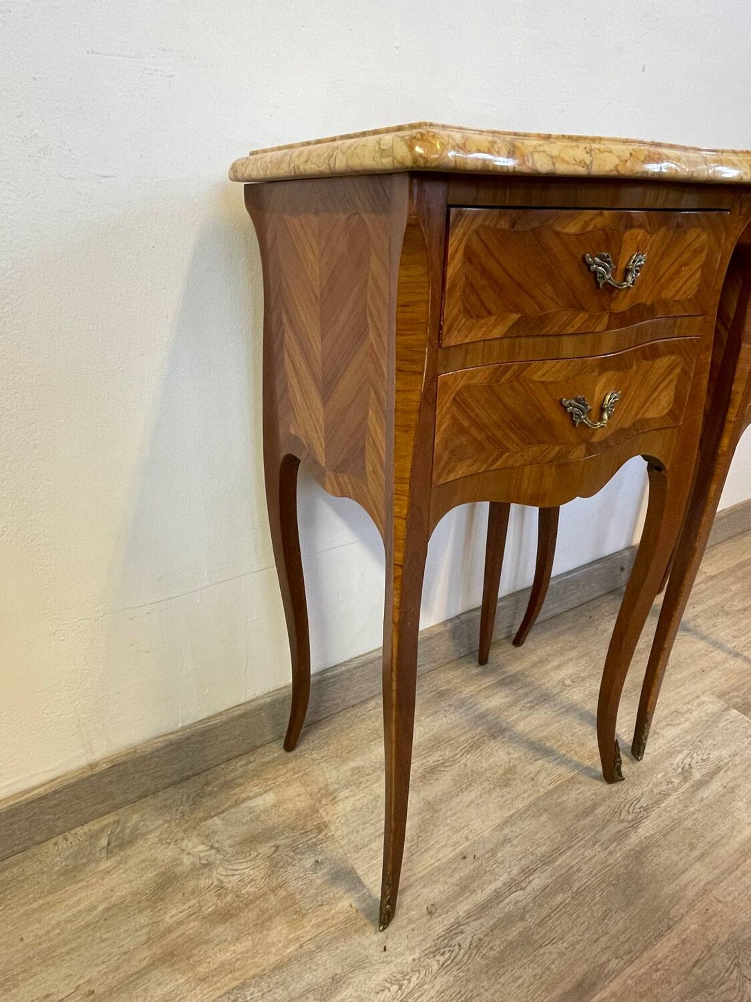Pair of Louis XV style bedside tables in rosewood marquetry