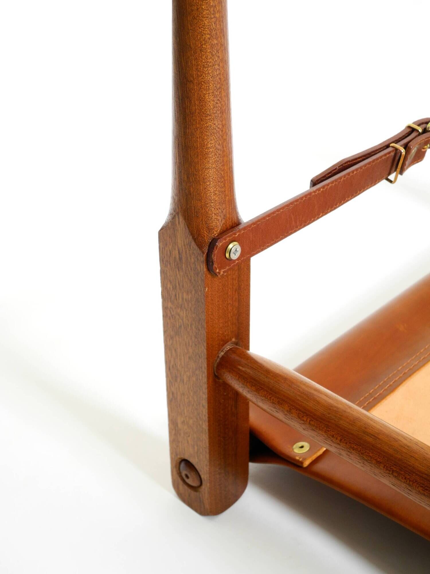 Rare 1990s safari stool with a teak frame and a seat made of brown saddle l