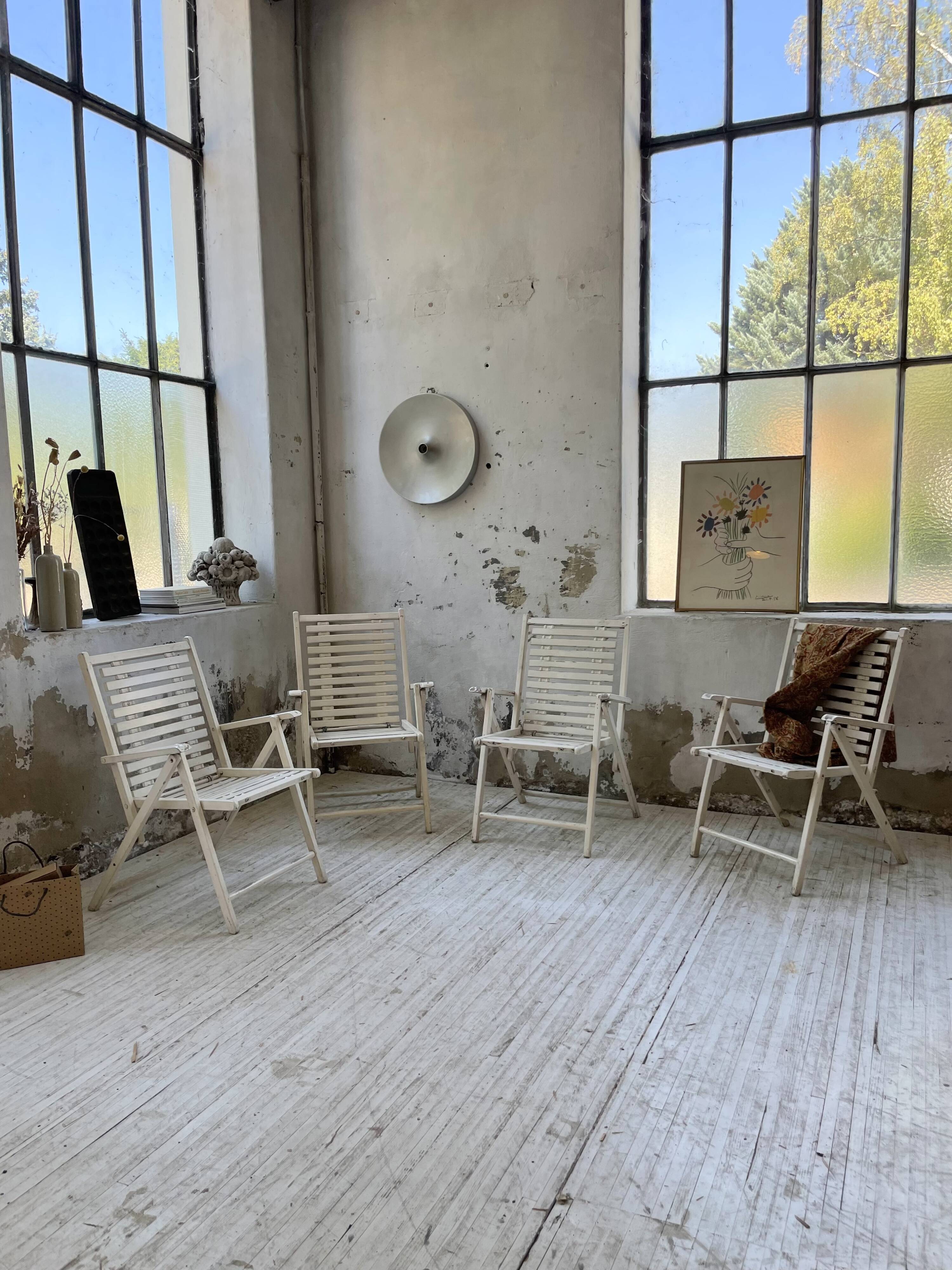 4 white wooden garden chairs