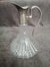 Glass and silver metal wine carafe