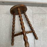 Wooden tripod farm stool