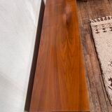 Teak row bobbin feet
