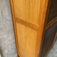 Vintage Parisian wardrobe with one mirrored door from the 60s in pine and wood