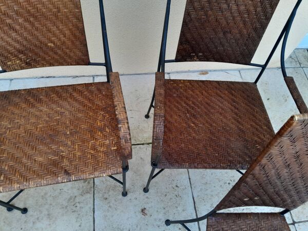 3 chaises et 2 fauteuils en fer forgé et rotin canné, années 50