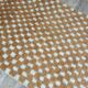 Moroccan Berber rug in ecru and camel wool with a graphic pattern, 245x150 cm.