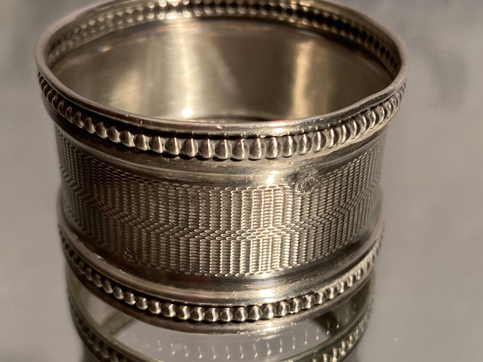 Solid silver napkin ring Minerva with Louis XVI style guilloché decoration