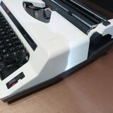 Olympia Alphamatic typewriter with Notice