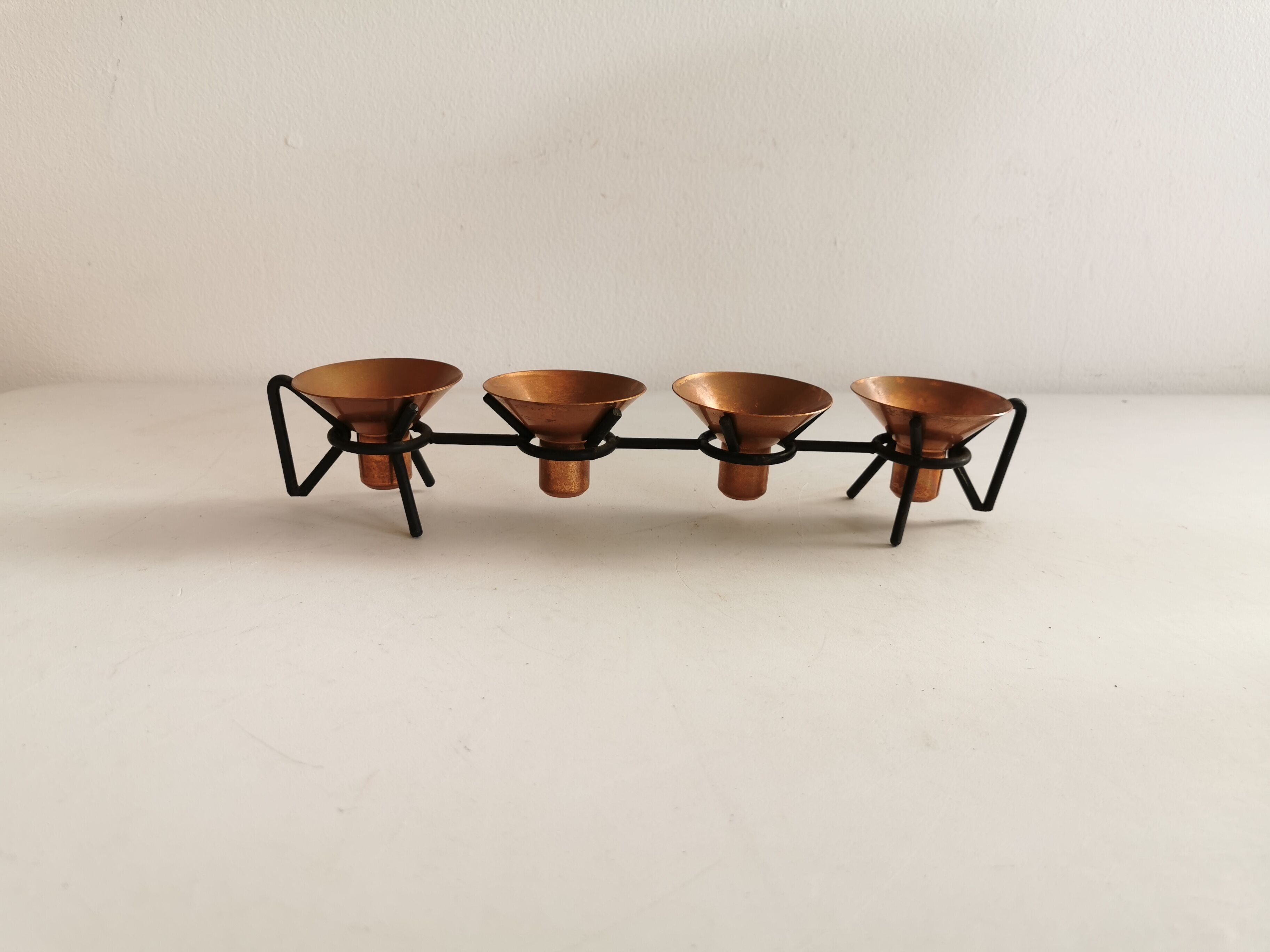Older Danish designed candlestick, made of cast iron and copper.