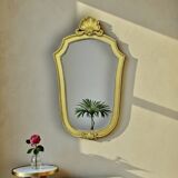 Antique wall mirror in gilded resin – back in red velvet