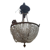 Antique bronze and crystal chandelier, formerly gas-powered, dating from the late 19th century.