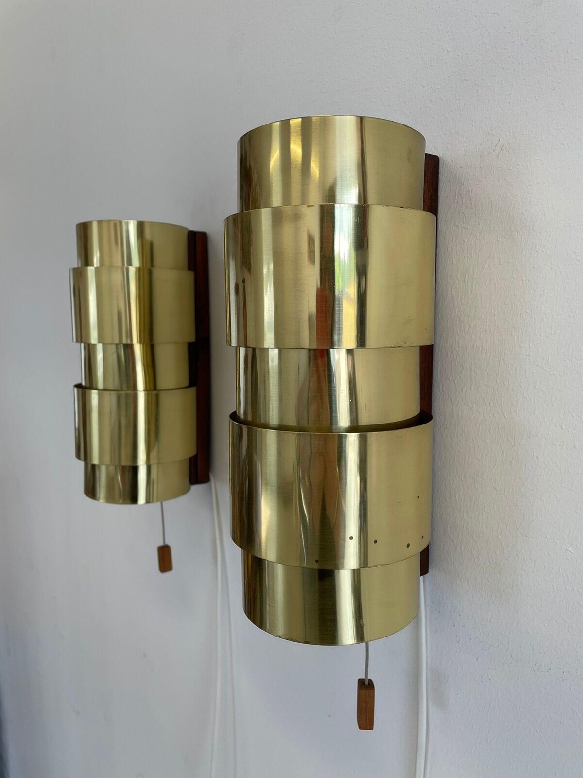 Pair of Scandinavian teak and brass sconces