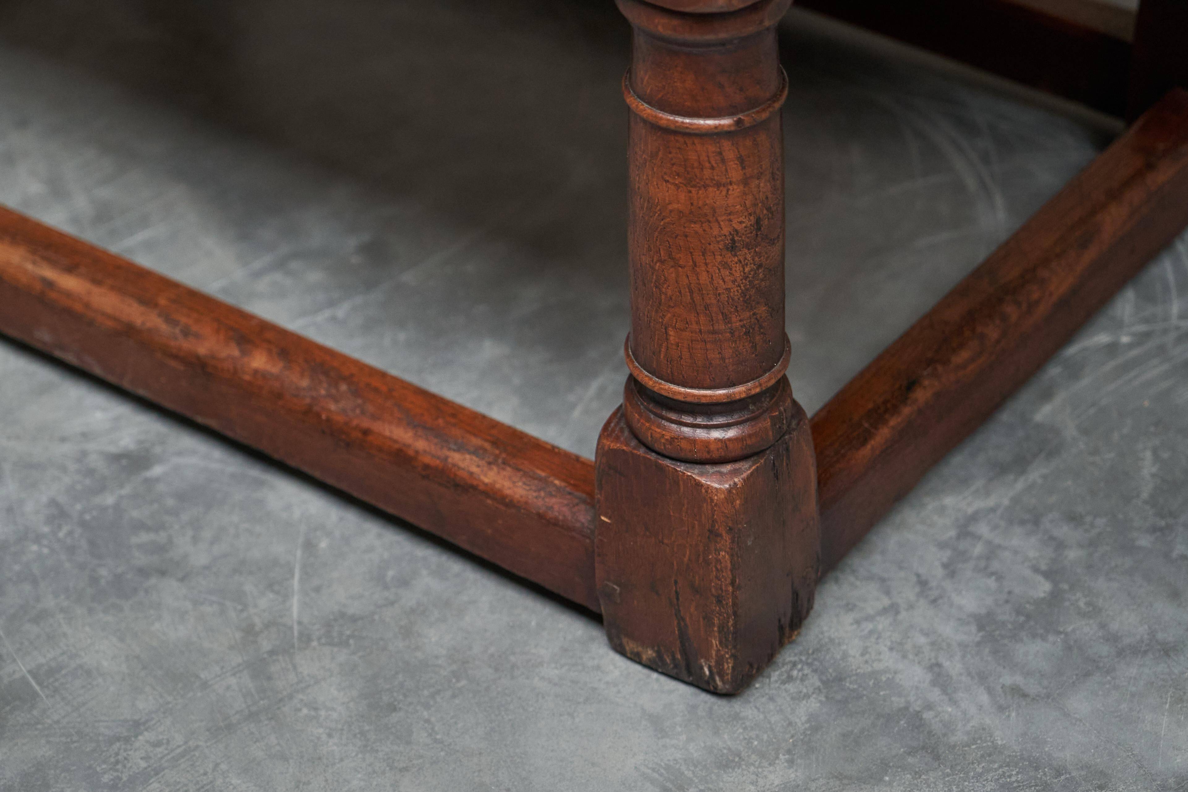 Antique solid oak coffee table in refectory style, 19th century.