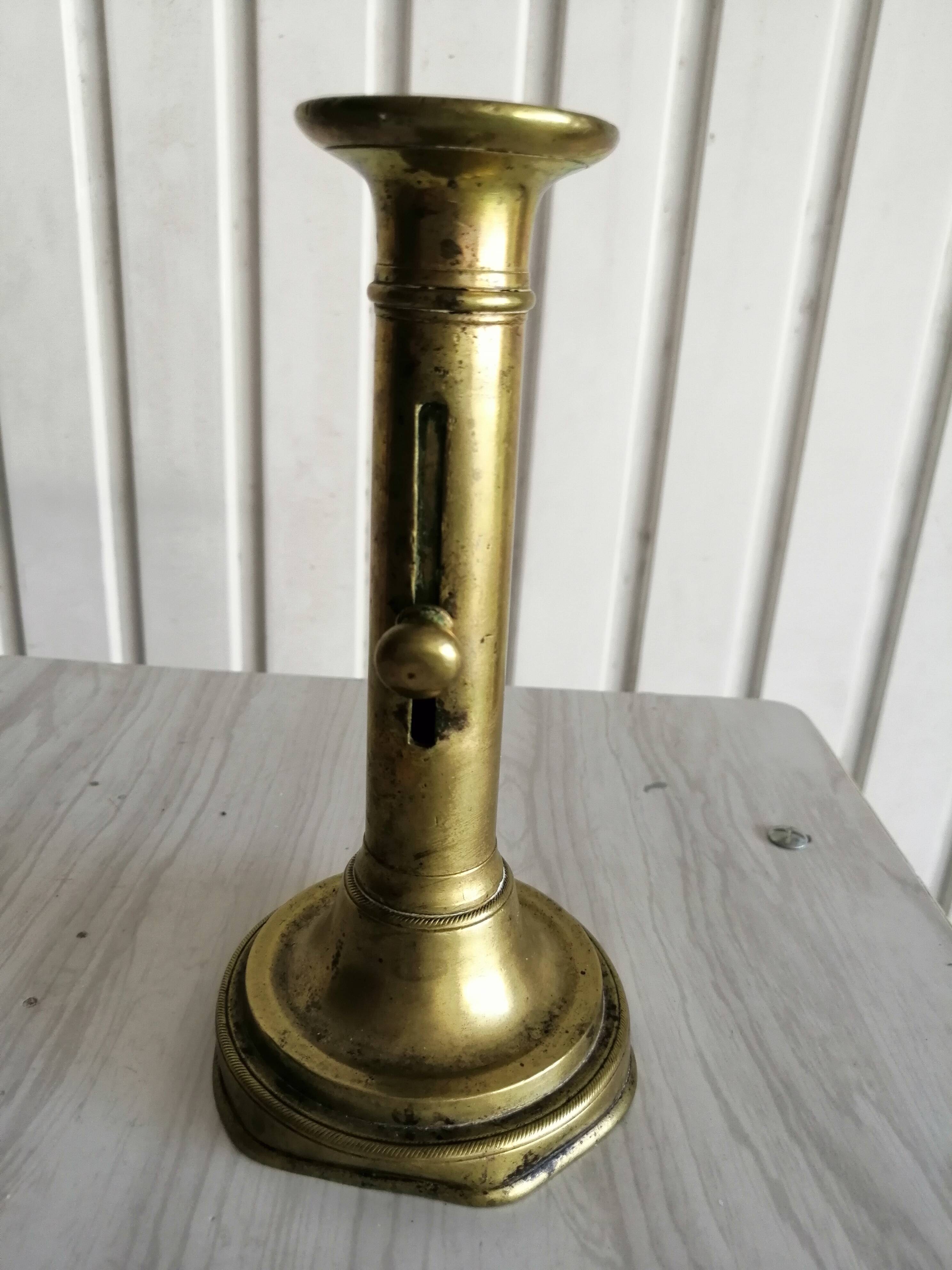 Brass candlestick with pusher