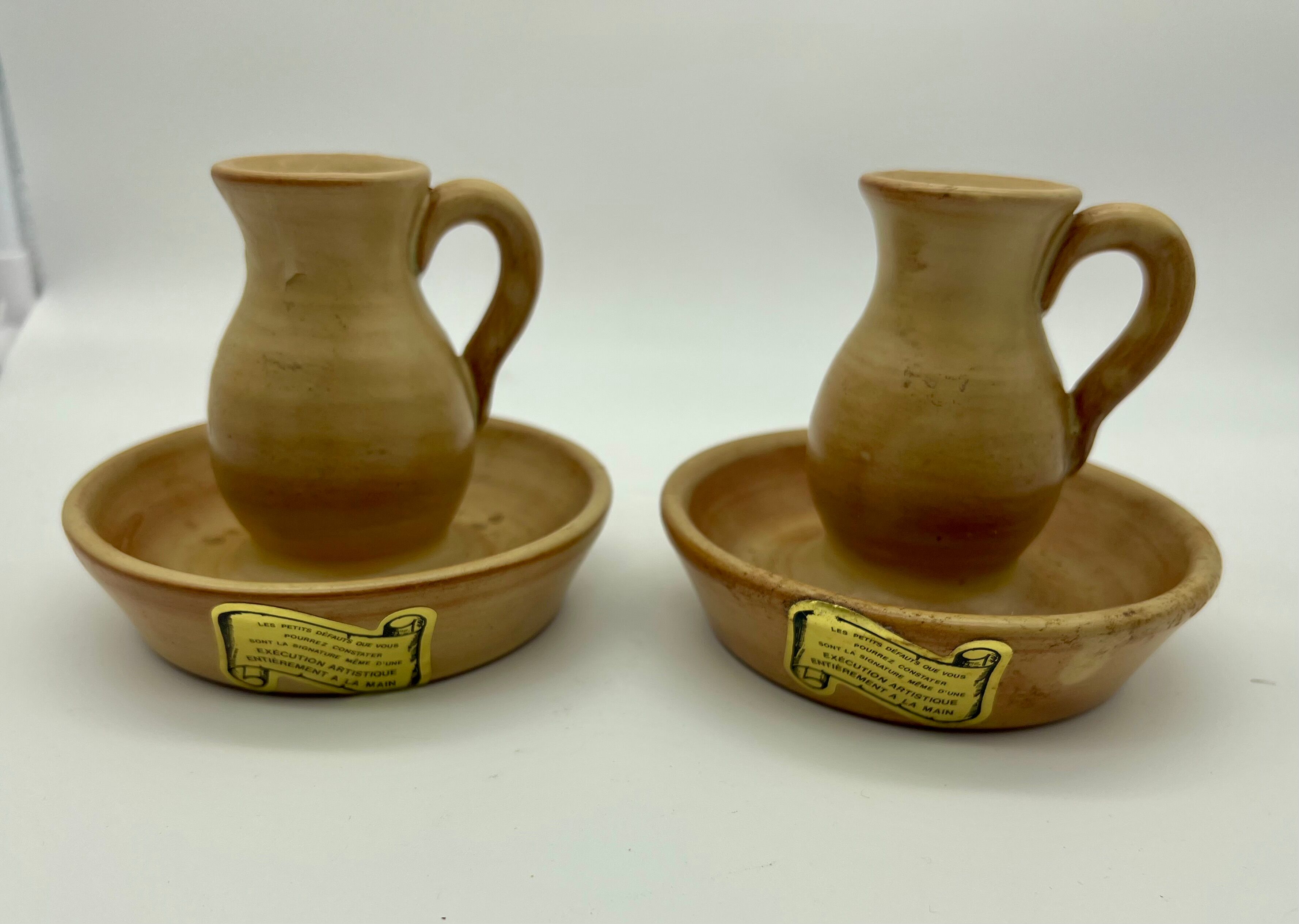 Pair of stoneware candle holders